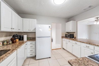 Short Sale. Spacious 2-bedroom, 2-bath, 2-car garage home in Sun on Caloosa Greens Executive Golf Course in Florida - for sale on GolfHomes.com, golf home, golf lot