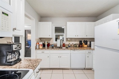 Short Sale. Spacious 2-bedroom, 2-bath, 2-car garage home in Sun on Caloosa Greens Executive Golf Course in Florida - for sale on GolfHomes.com, golf home, golf lot