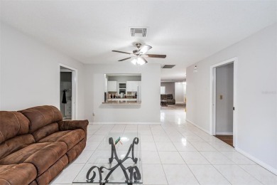 Short Sale. Spacious 2-bedroom, 2-bath, 2-car garage home in Sun on Caloosa Greens Executive Golf Course in Florida - for sale on GolfHomes.com, golf home, golf lot