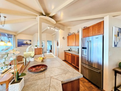 Hidden from the road by mature landscaping (terraced lava rock on Waikoloa Village Golf Club in Hawaii - for sale on GolfHomes.com, golf home, golf lot