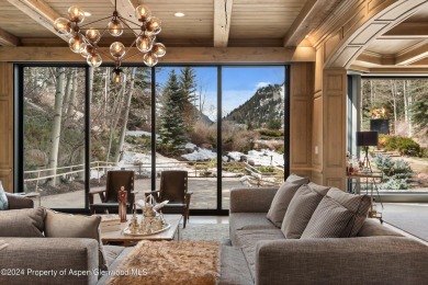 Revel in this captivating retreat nestled in the heart of on Aspen Golf Club in Colorado - for sale on GolfHomes.com, golf home, golf lot