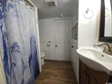 Ready to own a Cozy 2BR/2BA beach bungalow located within the on Prestwick Country Club in South Carolina - for sale on GolfHomes.com, golf home, golf lot