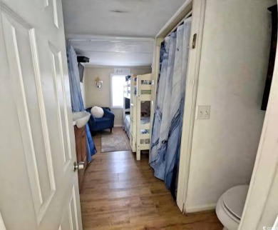 Ready to own a Cozy 2BR/2BA beach bungalow located within the on Prestwick Country Club in South Carolina - for sale on GolfHomes.com, golf home, golf lot