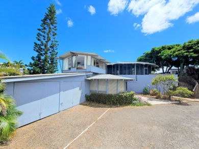 Hidden from the road by mature landscaping (terraced lava rock on Waikoloa Village Golf Club in Hawaii - for sale on GolfHomes.com, golf home, golf lot