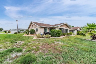 Short Sale. Spacious 2-bedroom, 2-bath, 2-car garage home in Sun on Caloosa Greens Executive Golf Course in Florida - for sale on GolfHomes.com, golf home, golf lot