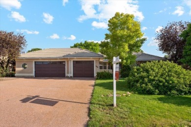 Live the Golf Course Dream at 444 W Archer Dr. Where every day on Desert Hawk At Pueblo West in Colorado - for sale on GolfHomes.com, golf home, golf lot