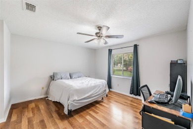 Short Sale. Spacious 2-bedroom, 2-bath, 2-car garage home in Sun on Caloosa Greens Executive Golf Course in Florida - for sale on GolfHomes.com, golf home, golf lot
