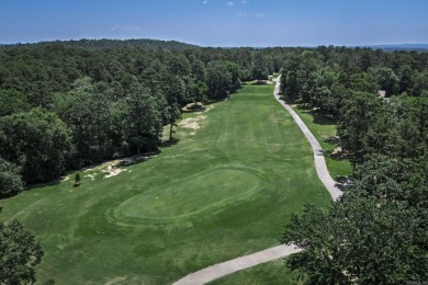 Located on the 7th hole of Coronado golf course, this home has a on Coronado Golf Course in Arkansas - for sale on GolfHomes.com, golf home, golf lot
