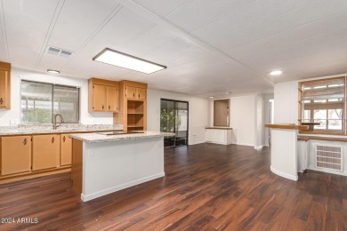 ON LEASED LAND-55+:This charming 2-bedroom, 1.75-bath home is on Sun City Riverview Golf Course in Arizona - for sale on GolfHomes.com, golf home, golf lot