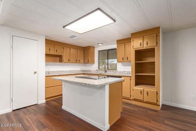 ON LEASED LAND-55+:This charming 2-bedroom, 1.75-bath home is on Sun City Riverview Golf Course in Arizona - for sale on GolfHomes.com, golf home, golf lot