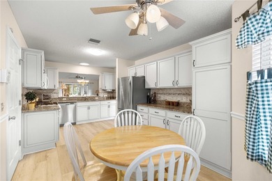 New Luxury Vinyl Flooring !! Freshly Painted !! Roof 2020 !! on The Links of Spruce Creek in Florida - for sale on GolfHomes.com, golf home, golf lot