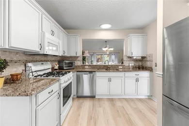 New Luxury Vinyl Flooring !! Freshly Painted !! Roof 2020 !! on The Links of Spruce Creek in Florida - for sale on GolfHomes.com, golf home, golf lot