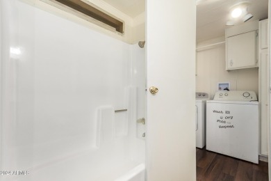 ON LEASED LAND-55+:This charming 2-bedroom, 1.75-bath home is on Sun City Riverview Golf Course in Arizona - for sale on GolfHomes.com, golf home, golf lot