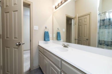 Spacious 2 story home tucked in a quiet cul-de-sac with stunning on WestRidge Golf Course in Texas - for sale on GolfHomes.com, golf home, golf lot