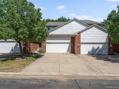 Discover elegant living in this Waterford Fairways condo on White Lake Oaks Golf Course in Michigan - for sale on GolfHomes.com, golf home, golf lot