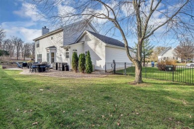 This beautiful 2-story w/finished lower level has an irrigated on Bear Creek Golf Club in Missouri - for sale on GolfHomes.com, golf home, golf lot