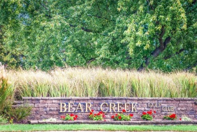 This beautiful 2-story w/finished lower level has an irrigated on Bear Creek Golf Club in Missouri - for sale on GolfHomes.com, golf home, golf lot