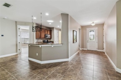 One or more photo(s) has been virtually staged. Located on a on Stonegate Golf Club in Florida - for sale on GolfHomes.com, golf home, golf lot