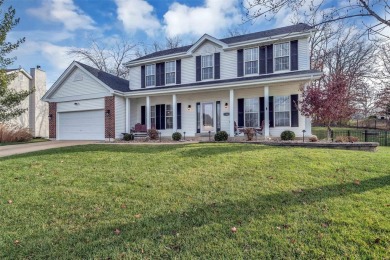 This beautiful 2-story w/finished lower level has an irrigated on Bear Creek Golf Club in Missouri - for sale on GolfHomes.com, golf home, golf lot