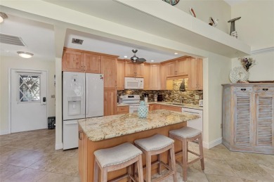 Furnished and Turnkey Villa- This completely remodeled end-unit on Capri Isle Golf Club in Florida - for sale on GolfHomes.com, golf home, golf lot