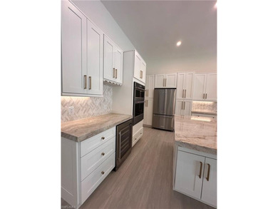 NEW CONSTRUCTION | GOLDEN GATE ESTATES | NAPLES Discover this on The Club At Twin Eagles in Florida - for sale on GolfHomes.com, golf home, golf lot