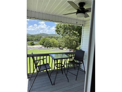 Wake up to lake views and easy living on Table Rock Lake. This on Holiday Island Executive Golf Course in Arkansas - for sale on GolfHomes.com, golf home, golf lot