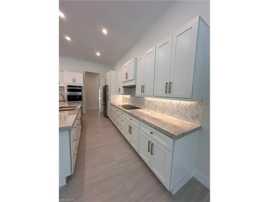 NEW CONSTRUCTION | GOLDEN GATE ESTATES | NAPLES Discover this on The Club At Twin Eagles in Florida - for sale on GolfHomes.com, golf home, golf lot