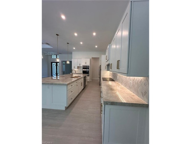 NEW CONSTRUCTION | GOLDEN GATE ESTATES | NAPLES Discover this on The Club At Twin Eagles in Florida - for sale on GolfHomes.com, golf home, golf lot