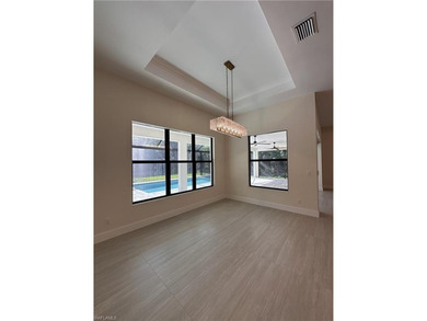 NEW CONSTRUCTION | GOLDEN GATE ESTATES | NAPLES Discover this on The Club At Twin Eagles in Florida - for sale on GolfHomes.com, golf home, golf lot