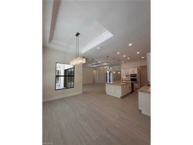 NEW CONSTRUCTION | GOLDEN GATE ESTATES | NAPLES Discover this on The Club At Twin Eagles in Florida - for sale on GolfHomes.com, golf home, golf lot