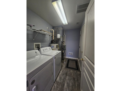 Sharp End unit, 2 bedrooms, 2 baths, move in and enjoy all that on Whisper Creek Golf Club in Illinois - for sale on GolfHomes.com, golf home, golf lot