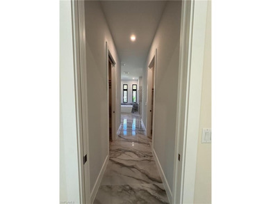 NEW CONSTRUCTION | GOLDEN GATE ESTATES | NAPLES Discover this on The Club At Twin Eagles in Florida - for sale on GolfHomes.com, golf home, golf lot