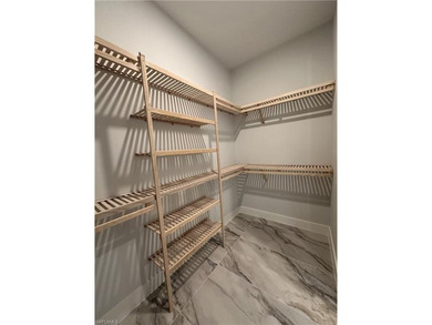 NEW CONSTRUCTION | GOLDEN GATE ESTATES | NAPLES Discover this on The Club At Twin Eagles in Florida - for sale on GolfHomes.com, golf home, golf lot