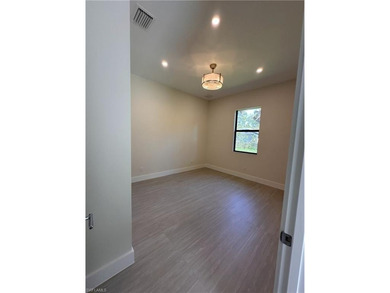 NEW CONSTRUCTION | GOLDEN GATE ESTATES | NAPLES Discover this on The Club At Twin Eagles in Florida - for sale on GolfHomes.com, golf home, golf lot