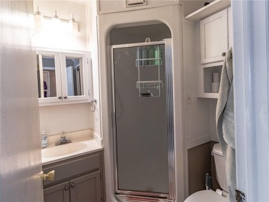 Welcome to this well-kept 2 bed, 2 full bath home nestled in a on Bella Vista Country Club - Scottsdale in Arkansas - for sale on GolfHomes.com, golf home, golf lot