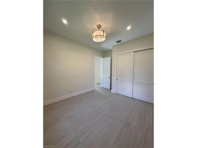 NEW CONSTRUCTION | GOLDEN GATE ESTATES | NAPLES Discover this on The Club At Twin Eagles in Florida - for sale on GolfHomes.com, golf home, golf lot