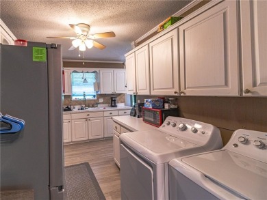 Welcome to this well-kept 2 bed, 2 full bath home nestled in a on Bella Vista Country Club - Scottsdale in Arkansas - for sale on GolfHomes.com, golf home, golf lot