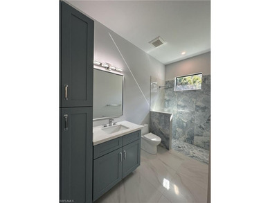 NEW CONSTRUCTION | GOLDEN GATE ESTATES | NAPLES Discover this on The Club At Twin Eagles in Florida - for sale on GolfHomes.com, golf home, golf lot