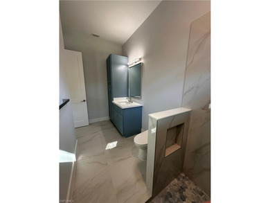 NEW CONSTRUCTION | GOLDEN GATE ESTATES | NAPLES Discover this on The Club At Twin Eagles in Florida - for sale on GolfHomes.com, golf home, golf lot