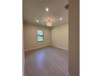 NEW CONSTRUCTION | GOLDEN GATE ESTATES | NAPLES Discover this on The Club At Twin Eagles in Florida - for sale on GolfHomes.com, golf home, golf lot