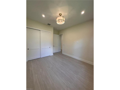 NEW CONSTRUCTION | GOLDEN GATE ESTATES | NAPLES Discover this on The Club At Twin Eagles in Florida - for sale on GolfHomes.com, golf home, golf lot