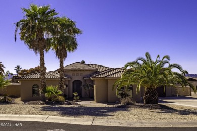 This home is located at the end of a private cul-de-sac in the on London Bridge Golf Course in Arizona - for sale on GolfHomes.com, golf home, golf lot