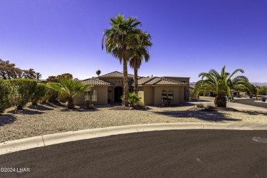 This home is located at the end of a private cul-de-sac in the on London Bridge Golf Course in Arizona - for sale on GolfHomes.com, golf home, golf lot