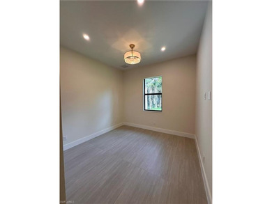 NEW CONSTRUCTION | GOLDEN GATE ESTATES | NAPLES Discover this on The Club At Twin Eagles in Florida - for sale on GolfHomes.com, golf home, golf lot