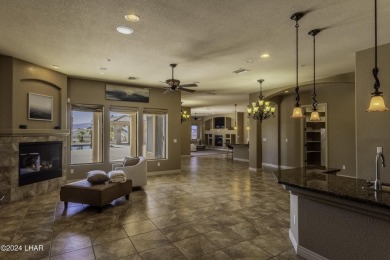 This home is located at the end of a private cul-de-sac in the on London Bridge Golf Course in Arizona - for sale on GolfHomes.com, golf home, golf lot