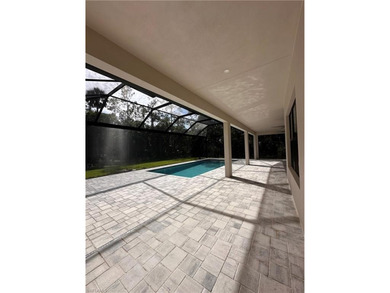 NEW CONSTRUCTION | GOLDEN GATE ESTATES | NAPLES Discover this on The Club At Twin Eagles in Florida - for sale on GolfHomes.com, golf home, golf lot