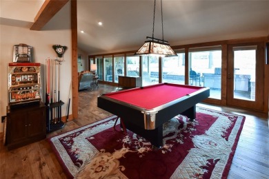 Step into luxury and warmth of this breathtaking three-bedroom on Holly Lake Ranch Golf Club in Texas - for sale on GolfHomes.com, golf home, golf lot