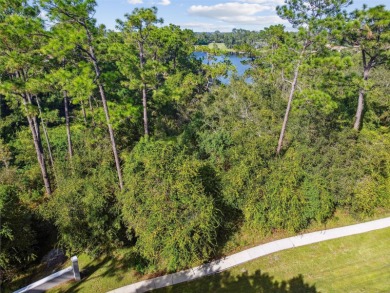 Build your dream home on this expansive, LAKEFRONT, 1.36 acre on DeBary Golf and Country Club in Florida - for sale on GolfHomes.com, golf home, golf lot