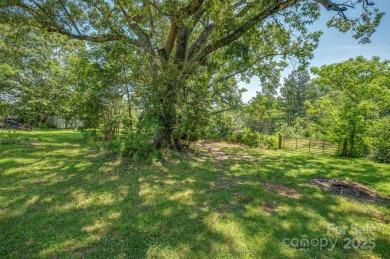 You don't want to miss this one!  It is a four bedroom two bath on Meadowbrook Golf Course in North Carolina - for sale on GolfHomes.com, golf home, golf lot