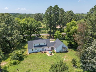 You don't want to miss this one!  It is a four bedroom two bath on Meadowbrook Golf Course in North Carolina - for sale on GolfHomes.com, golf home, golf lot